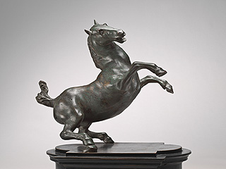 da Vinci. Statuette of a Rearing Horse. Done in an artificial patina now called Renaissance Black which involved painting the piece with a solution of copper nitrate, heating it and buring it in milk saturated sand for a month.