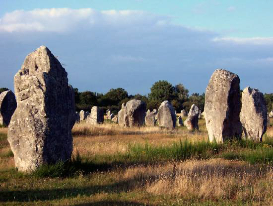 Menhirs at Carnac. ''The menhirs at Carnac have one flat side and one round side making them polarized. Granite, from which the stones were made, is also highly magnetic. The cut side is always in north-south axis; and the stones have a pointed top.''