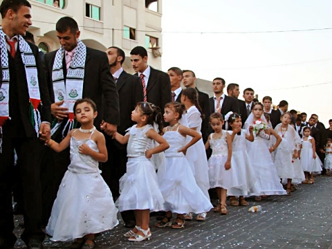 ''Each groom received a gift of 500 dollars from Hamas.  The pre-pubescent girls, dressed in white gowns and adorned with garish make-up, received bridal bouquets.  We are presenting this wedding as a gift to our people who stood firm in the face of the siege and the war, local Hamas strongman Ibrahim Salaf said in a speech. ''Paul L. Williams PHD.
