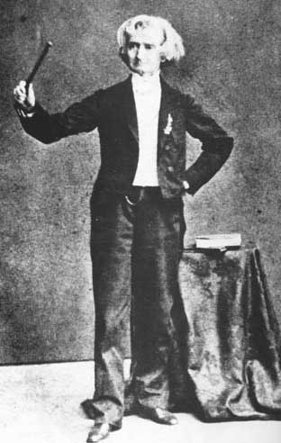 The moment of triumph, his first, came for Berlioz while on an 1867-68 tour of Russia. The photograph above, taken at that time, shows it came too late; the flamboyant composer has become an old man. Tired, subdued, critically ill, he died only a year later. 