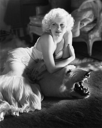 "She was known as The Blond Bombshell. If you look at the studio portraits by George Hurrell you assume she was just another heavy-lidded, sexy star. But Jean Harlow's true talent was as a comedienne.  Friends described her as casual and fun loving with no pretense whatsoever. She held the unofficial dice record at Agua Caliente Casino in Mexico, with thirty-four straight passes.  Harlow's humorous attitude comes across best in Dinner at Eight. She delivers her lines with machine-gun precision, her natural wit punctuating the spaces between her sentences."