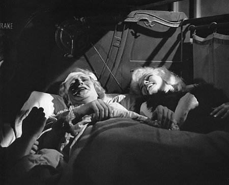 ''Wilder compared her screen presence to Garbo. Speaking of Monroe, there is the scene where she sings “I Wanna Be Love By Love” while wearing what amounts to a see-through gown, so carefully lit that Wilder managed to get it passed the vigilant eyes of the censors.     ''