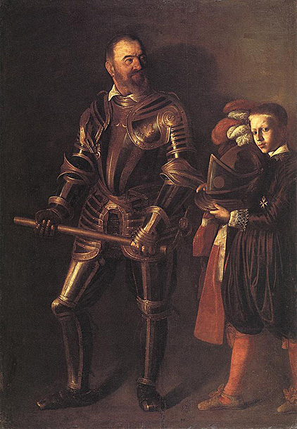 Alof de Wignacourt. 1607. "The boy's lively expression and alert gaze make him an attractive subject in his own right, to the extent that he was several times copied by later artists visiting Malta. Wignacourt, encased in splendid black and gold Milanese armor, stares upwards and outwards out of the frame in a dignified manner that invites the viewer to gaze upon him in awe, leaving the page, with his look of boyish interest, as the sole thoroughly human presence, and a far more sympathetic one than the self-conscious man of steel. The double-portrait with the pageboy was an unusual combination for the time. It may have been ordered by Wignacourt to stress the dignity of his court, or Caravaggio may have been inspired by a painting by Titian that he could have seen in his youth in Milan, The Speech of Alfonso d'Avalos, showing the Spanish governor of the city addressing his knights with a page beside him holding his helmet."