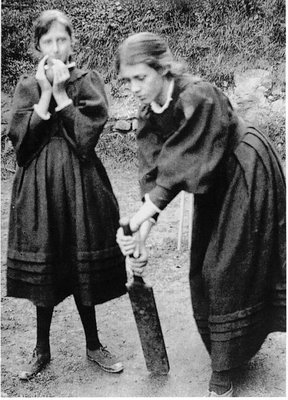 A light moment in a predominantly gloomy childhood. Virginia L age twelve, plays cricket with her sister in 1894.
