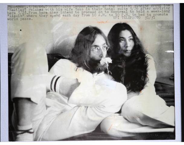 A original photo showing Lennon and Yoko Ono is displayed at an exhibition in Buenos Aires