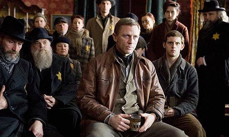 ---Zwick openly admits that one of his purposes in making the film was to enhance the image of the Jews. Earlier cinematic efforts to champion them by casting them as victims helped entrench the idea, he says, that they somehow acquiesced in their fate. Zwick wanted to change that. "Passivity suggests people did something willingly," he told an interviewer. "Powerlessness means they had no access to weapons." The case for violent Jewish assertiveness in the face of the enemy is starkly put. Hawk-brother tells dove-brother: "You don't have the stomach to do what must be done,"---click image for source...