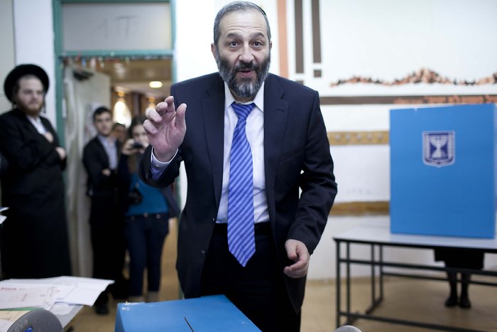 ---Ultra Orthodox politician Aryeh Deri of the Shas party seen, casts his vote in the Israeli general elections on Tuesday, January 22, 2012 in a Jerusalem school. (Credit: FLASH 90)---click image for source..