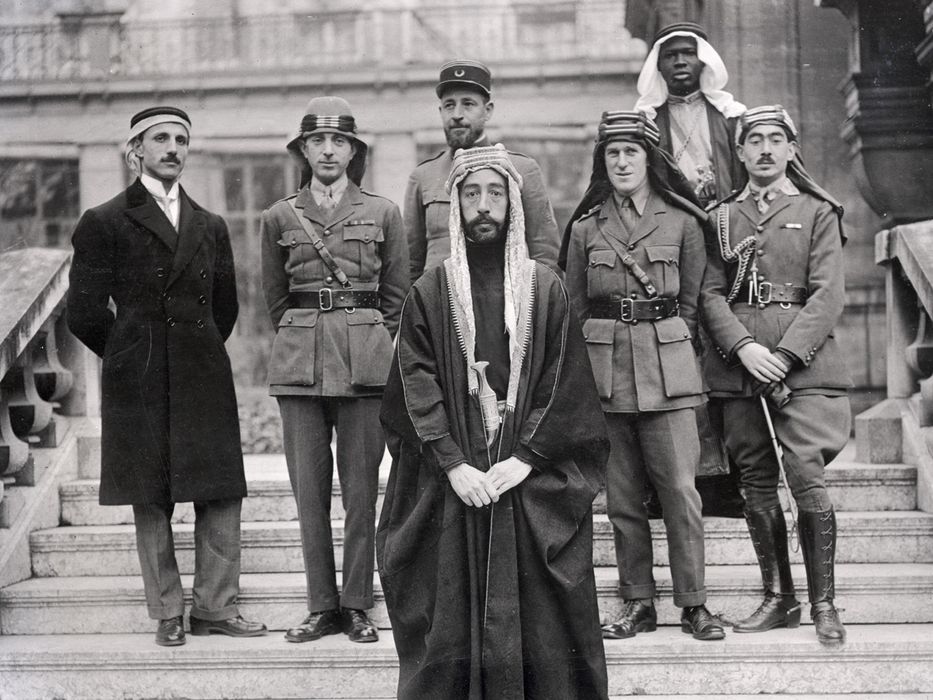 ---Certainly one of the more unusual sights at the peace conference called to redraw the map of the world after the First World War was the member of the British delegation walking around Versailles in Arab robes. It was at the Paris Peace Conference from January to June 1919 that T.E. Lawrence would push forward his campaign for Hashemite Kingdoms. After the end of the World War I, T.E. Lawrence harbored an overriding political goal: overturning the secret 1916 Sykes-Picot Agreement through which Britain and France, allies in the war, had arranged to carve up the Near East after war. France would be granted Syria and Lebanon, Britain would rule Mesopotamia and Palestine. The Arabs, with whom Lawrence had fought and to whose cause he was dedicated, would get full control of nothing. Lawrence’s military success during the war had won him a hearing in Britain. ---click image for source...
