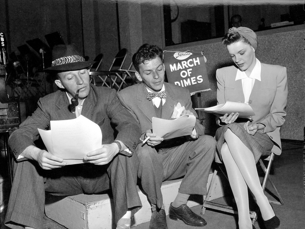 ---Bing Crosby, Frank Sinatra, and Judy Garland read...click image for source...