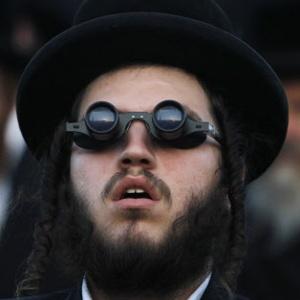 ---Members of some ultra-Orthodox Jewish communities in Jerusalem, are resorting to peculiar ways to avoid falling into temptation while looking at women dressed in a less conservative way … The latest trend are special glasses that allow you to clearly see at the distance of a few meters, but blur everything that is closer than that.---click image for source...