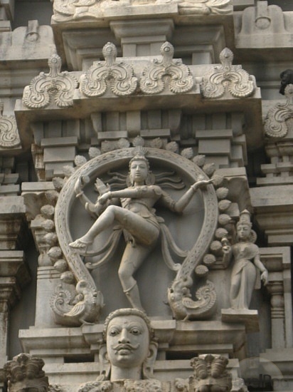 ---The cosmic dance of Shiva symbolises the interplay of dynamic and static divine energy flow, containing the five principles of eternal energy - creation, preservation, destruction, illusion and emancipation. Shiva dances in 'Rudra Tandava' or the dance of destruction in an aureole of fire, creating wild thunder storms all around the universe, even shattering the Sun, the Moon and stellar bodies with his matted hair, marks of ash on the forehead, trident and drum, lifting his left leg and balancing over a demon of ignorance, with snakes crawling over his arms, legs and braided hair that depict egotism....click image for source...