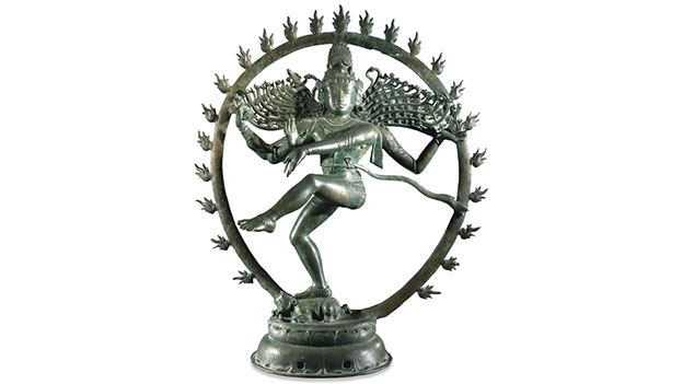 ---Bronze figure of Nataraja From Tamil Nadu, southern India Chola dynasty, around AD 1100 Dancing Shiva in a ring of fire The Hindu god Shiva appears as the lord of the dance, Nataraja, in a ring of fire. His long ascetic's hair flies out on either side of his head as he performs his dance. Nestling within his hair is a small figure. This is the goddess Ganga, the personification of the holy River Ganges, who, legend tells, fell to earth through Shiva's hair. Also visible in his hair are the crescent moon and the intoxicating datura flower; both are closely associated with his wild nature. Beneath his foot he tramples upon the dwarf of ignorance, Apasmara.---click image for source...